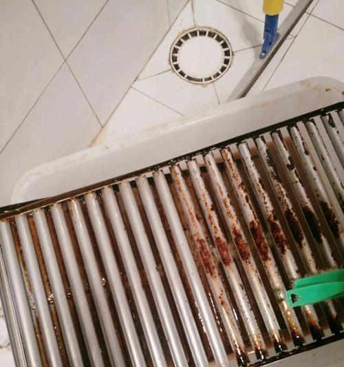 解决抽油烟机叶轮厚油垢的清洗方法（高效清洗技巧）